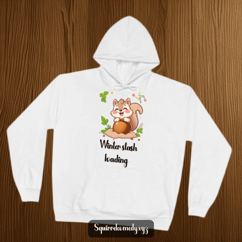 Funny hoodie featuring a fluffy squirrel character excitedly burying a giant acorn, perfect for cozy, humorous wear.